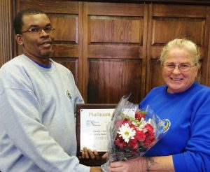 Water Production Superintendent Herbert Head thanks Operator Teresa Swan for her conscientious service.